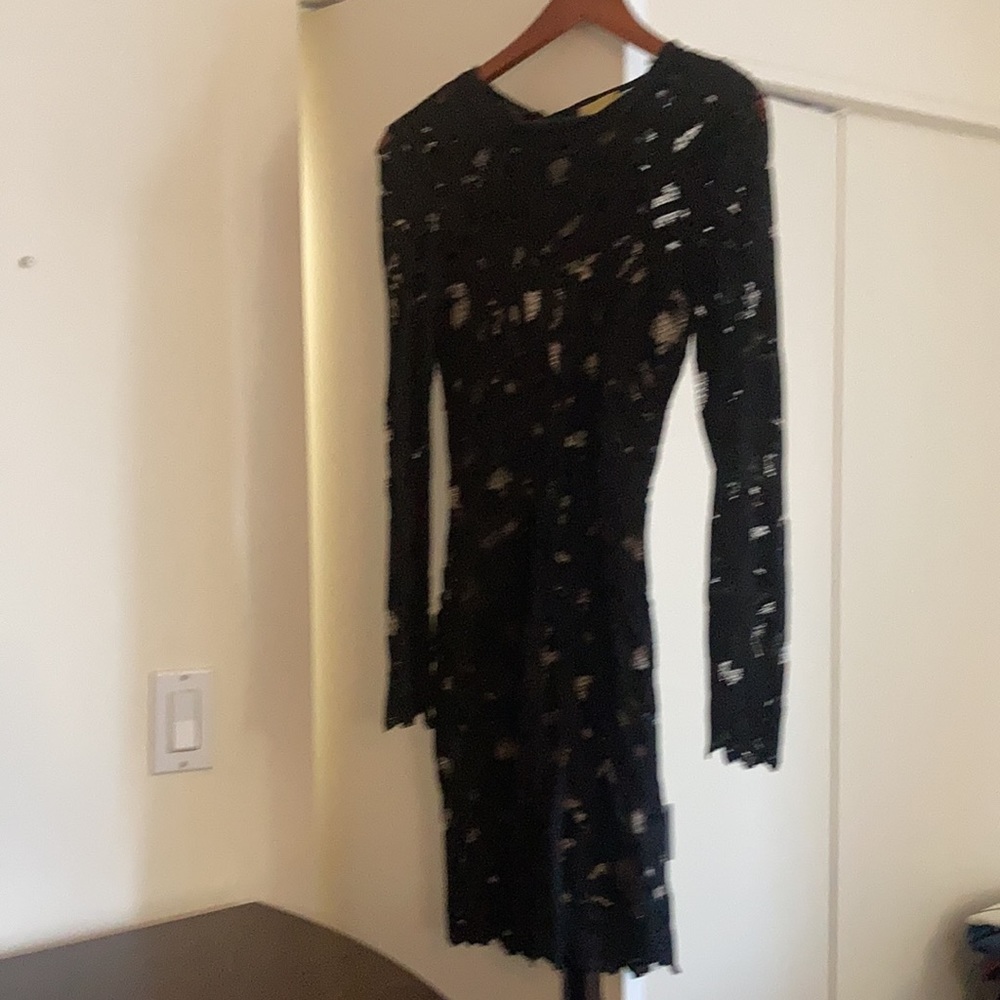 H&M gold collection.Black Lace, Size 4. Fitted to body/ nude lining under dress